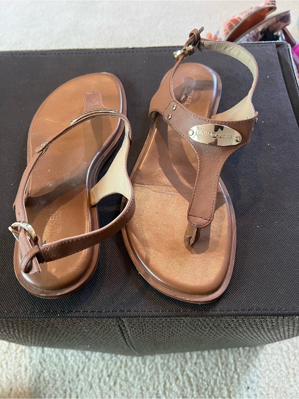 Michael Kors Brown Leather T-Strap Sandals with Gold Logo Plaque